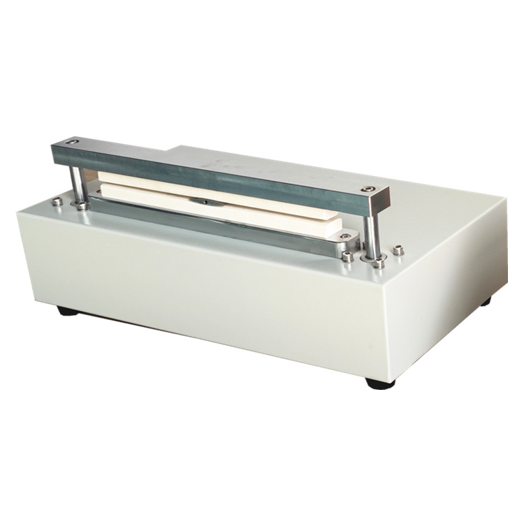 LSST-01 sample jig for three-side-seal package 1